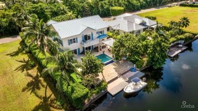 303 BIMINI DRIVE | EXCLUSIVE 5-BED CANALFRONT HOME